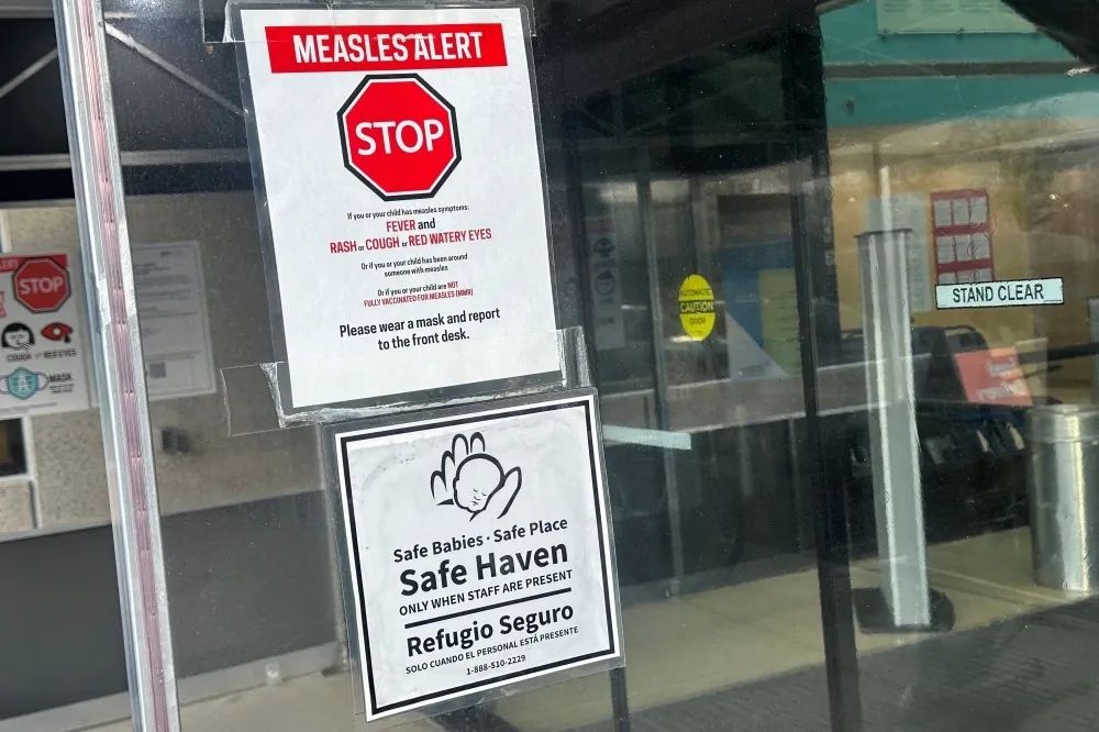 A measles alert sign hangs outside the entrance to the Cohen Children’s Medical Centre, where the state health department confirmed that a baby tested positive and that there is a possibility of exposure to others at the facility, in New York March 14, 2025. — Reuters pic